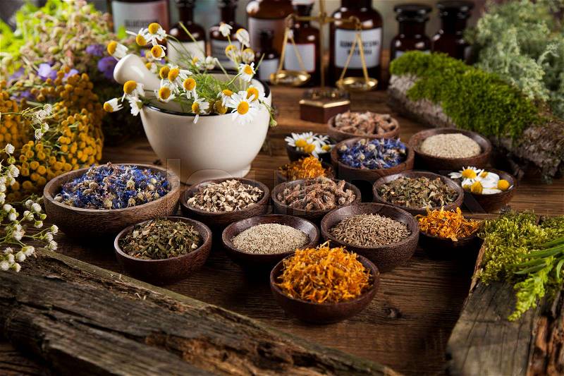 Natural medicine on wooden table background, stock photo