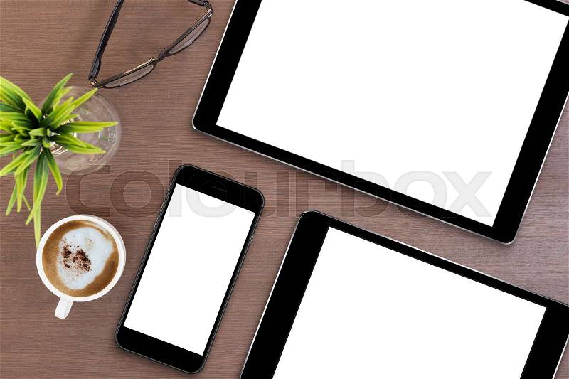 Phone and tablet blank screen on table top view, mock up smart phone and digital tablet, stock photo