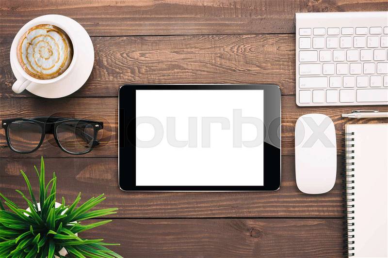 Digital tablet blank screen on work desk, mockup black tablet, stock photo