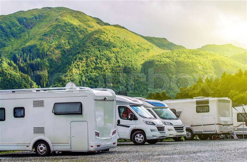 RV Park Camping. Modern Camper Motorhomes in the RV Park, stock photo