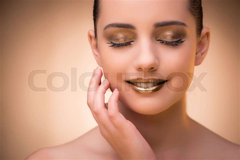 Woman with beautiful make-up against background, stock photo