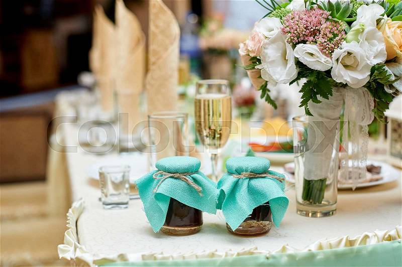 Wedding table decorated with flowers in restaurant, stock photo