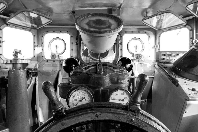 Controls room on battleship ,wheel and other meter for drive a ship, stock photo