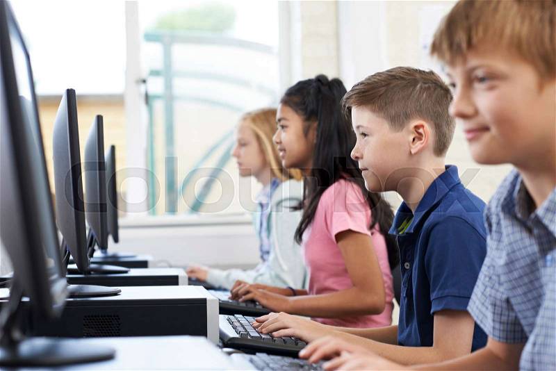 Male Elementary Pupil In Computer Class, stock photo