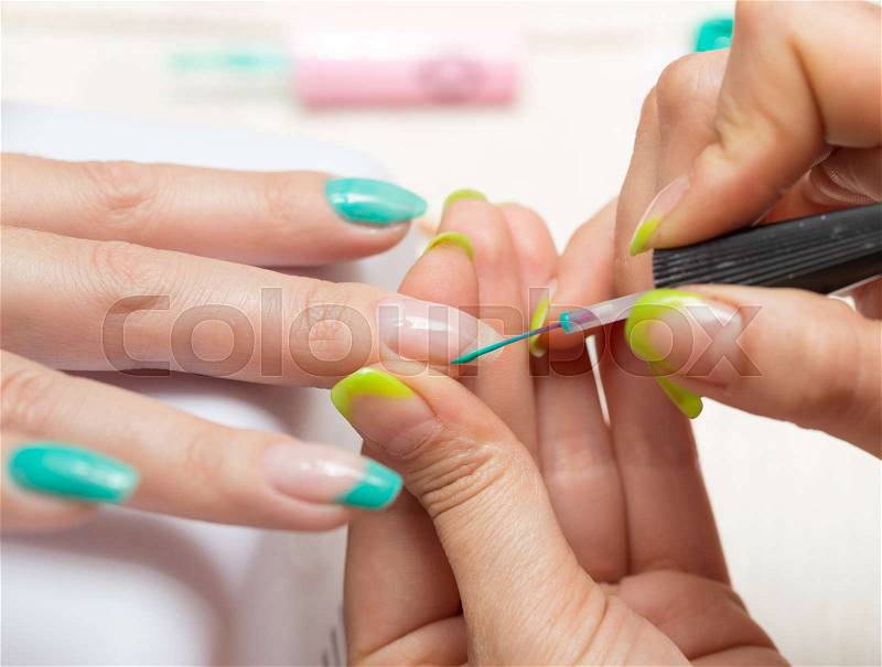 Women in a beauty salon manicure, stock photo