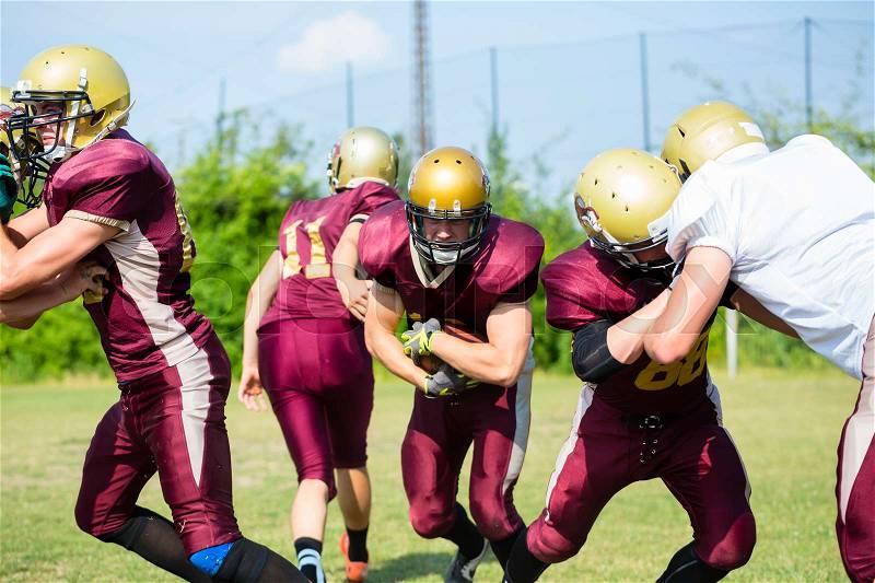 Defense after pass at American Football Game, stock photo