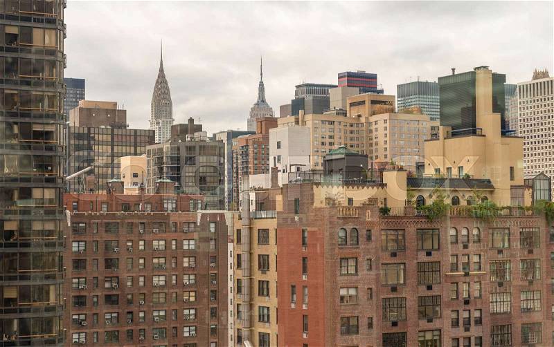 Aerial view of Manhattan buildings. Metropolis skyline, stock photo