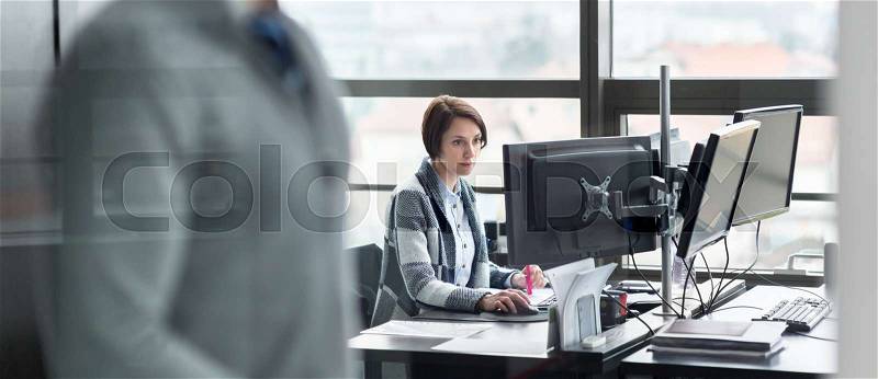 Personal assistant working in corporate office. Business and entrepreneurship concept, stock photo