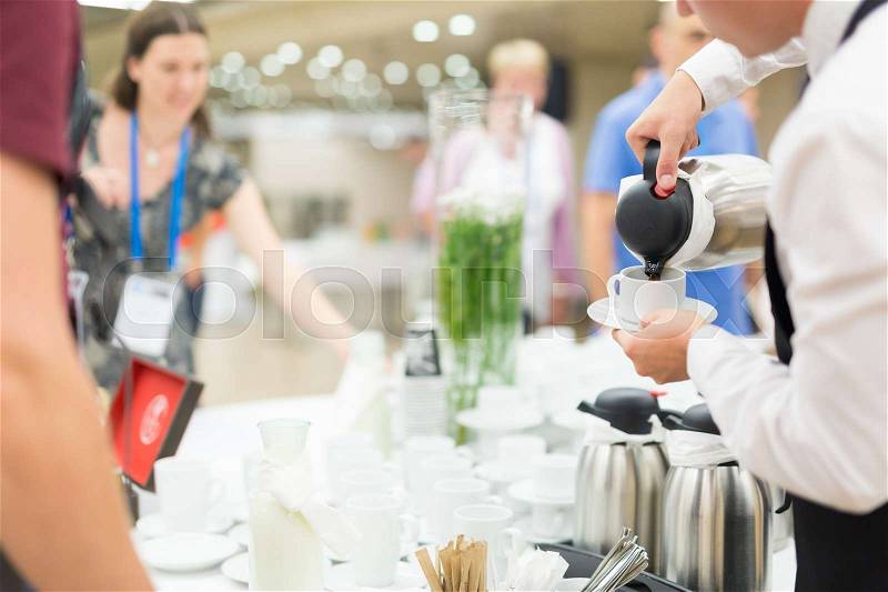 Coffee break at conference meeting. Business and entrepreneurship, stock photo