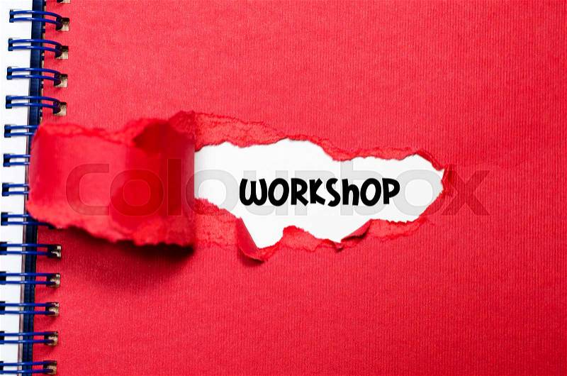 The word workshop appearing behind torn paper, stock photo