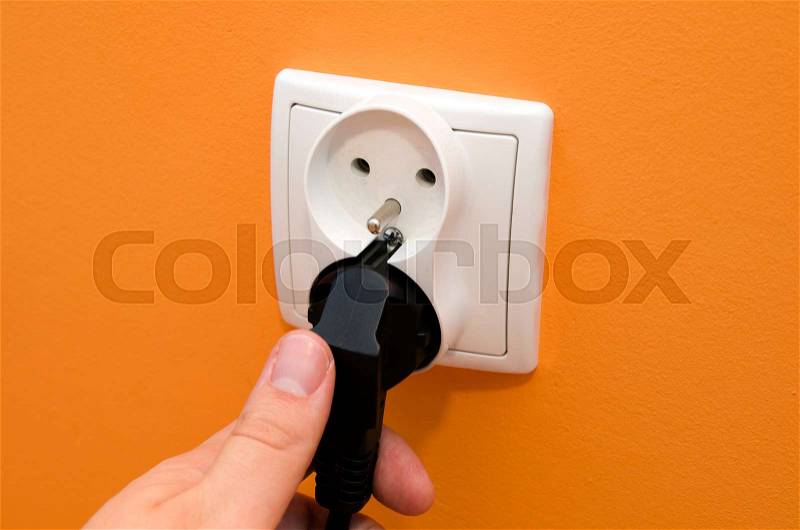 Electrical socket in wall. Electrical bill utilities cost increase rise socket wall composition, stock photo