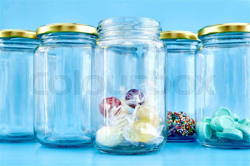A studio photo of glass storage jars, stock photo