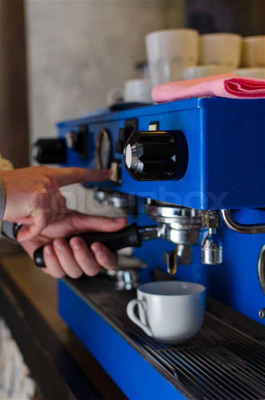 Close-up photo of new blue coffee machine, stock photo
