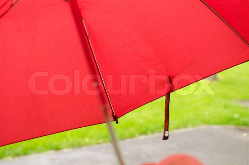View to the umbrella under the rain during the summer, stock photo