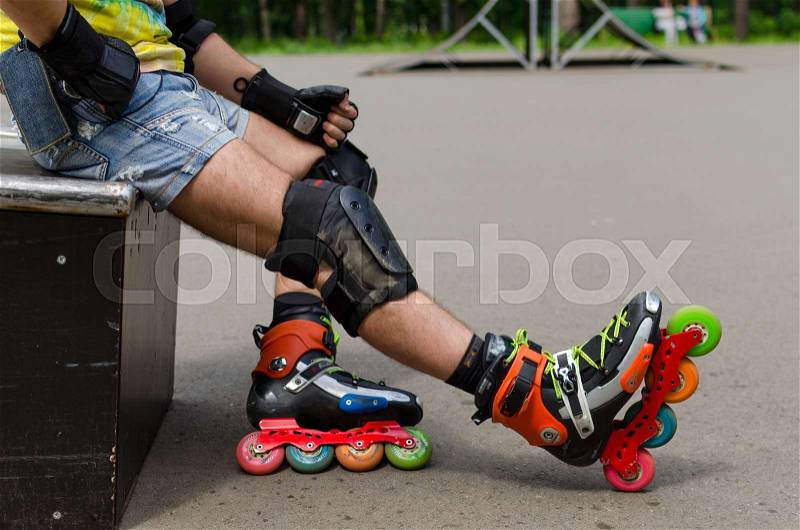 Young man with on the roller skates, stock photo