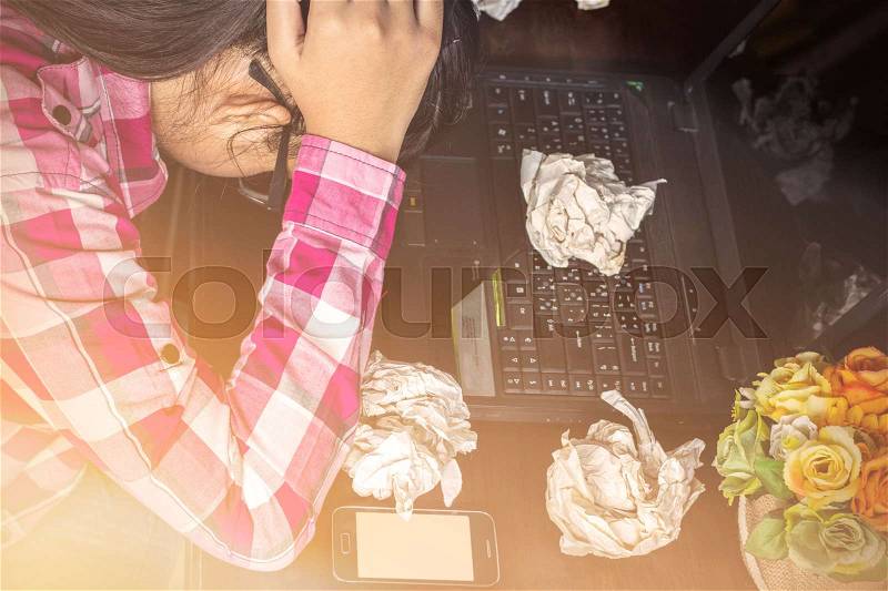 Women with stress on your desk at work, stock photo