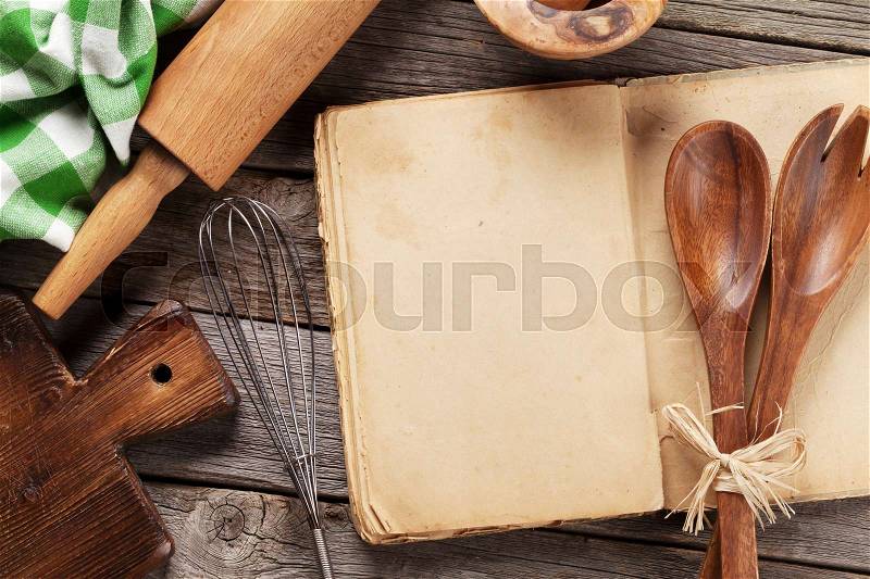 Blank vintage recipe cooking book and utensils. Top view with copy space, stock photo
