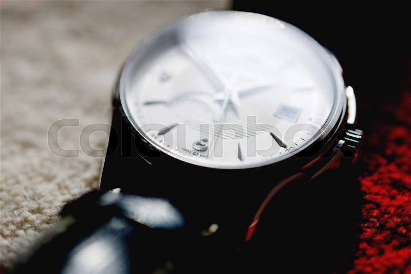 Macro detail of swiss made watch shot with macro lens luxury male accessory for business, stock photo