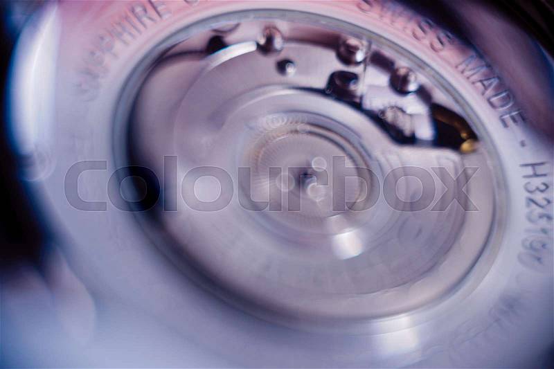Abstract extreme close-up details of luxury swiss made watch mechanism , stock photo