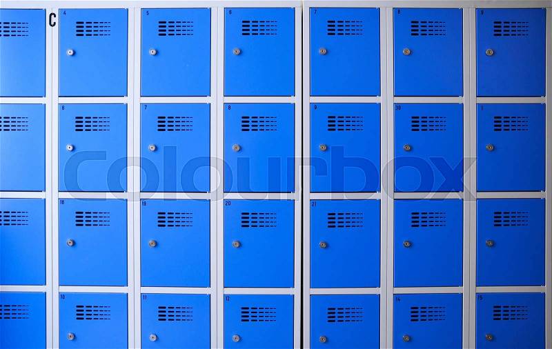 Security, safety and storage concept - school or gym blue metal lockers, stock photo