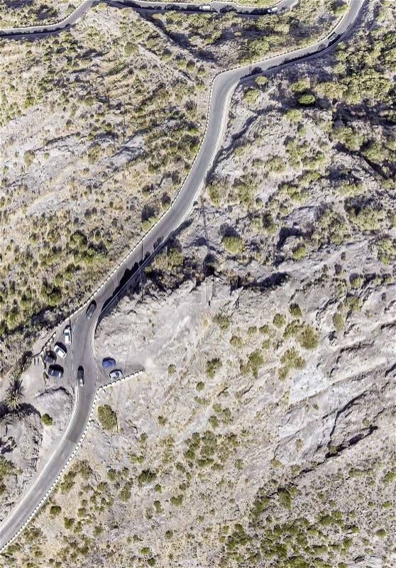 Windy mountain road, overhead view, stock photo