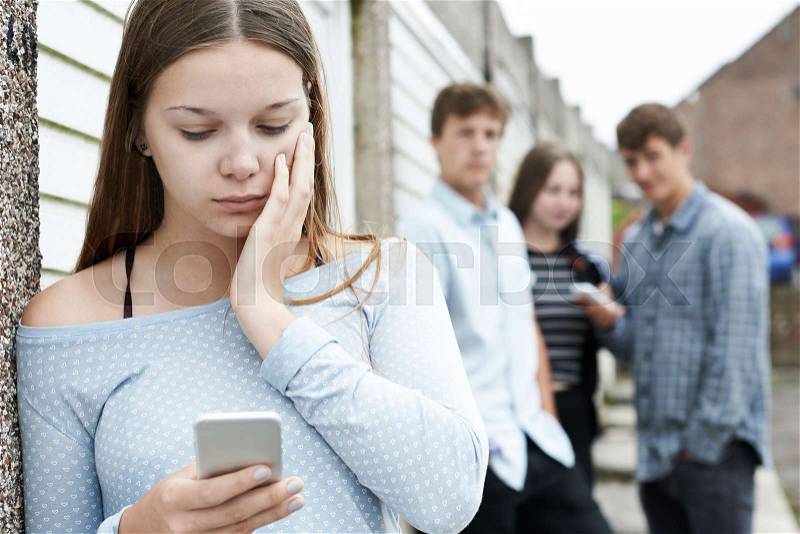 Teenage Girl Victim Of Bullying By Text Messaging, stock photo