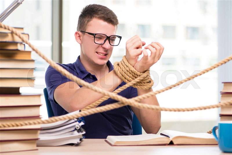 The young student forced to study tied, stock photo