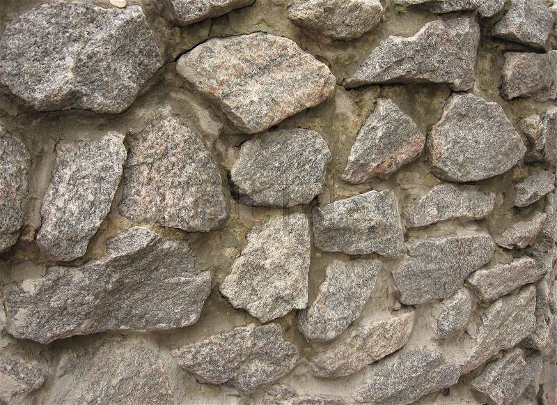 Wall built of gray stone, fence, close-up, stock photo