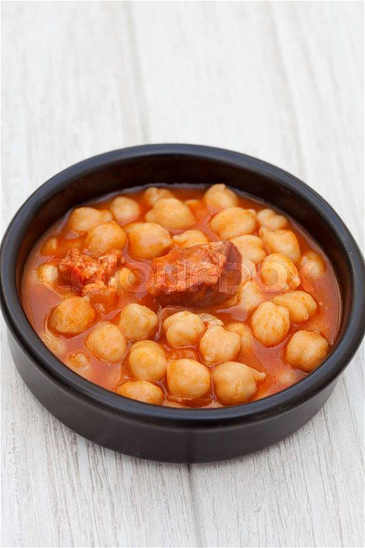 Dish of Spanish-style cooked chickpea. Delicious homemade food, stock photo