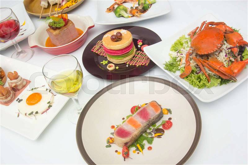 International food for dinner on white table, stock photo