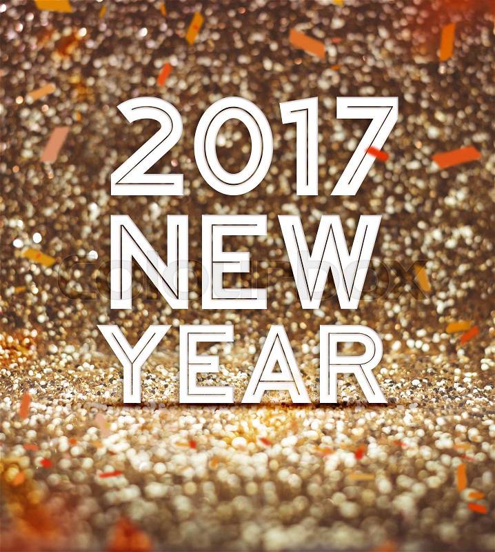 Happy new year 2017 year number with confetti at sparkling golden glitter background ,Holiday Greeting card, stock photo