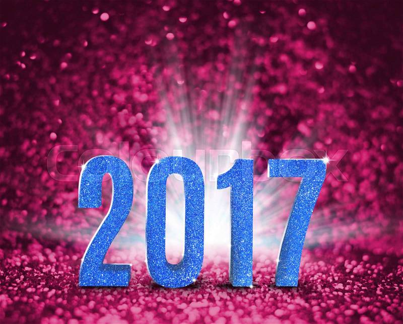 2017 new year with blue glitter texture with white explore light on pink sparkling background,Holiday Concept, stock photo