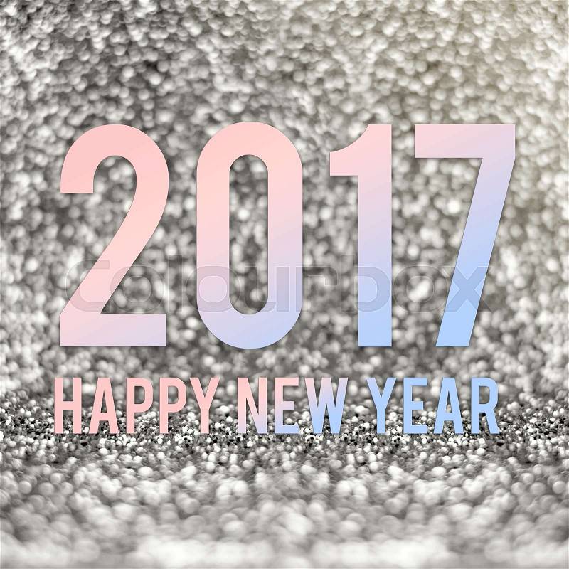 happy new year 2017 in material color at silver sparkling glitter background, stock photo