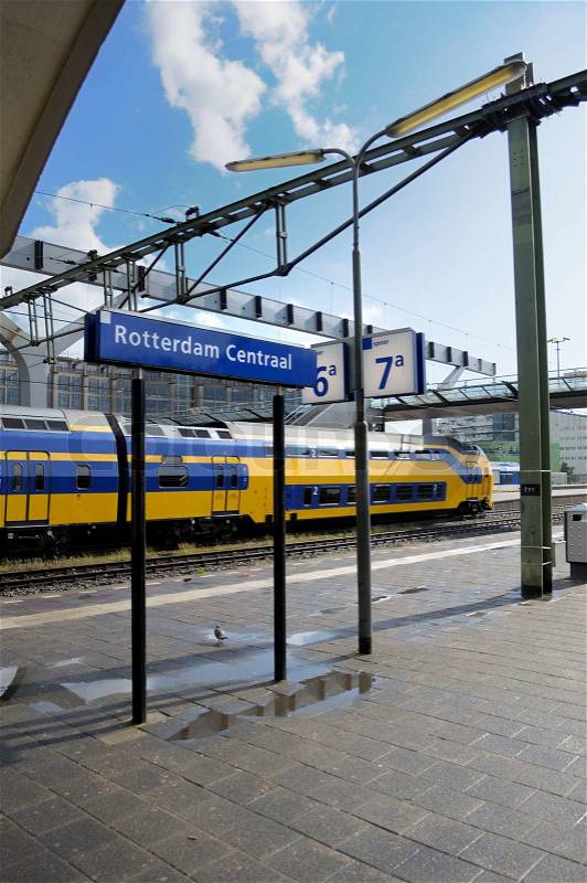 Railroad station platform in Rotterdam central train station, stock photo