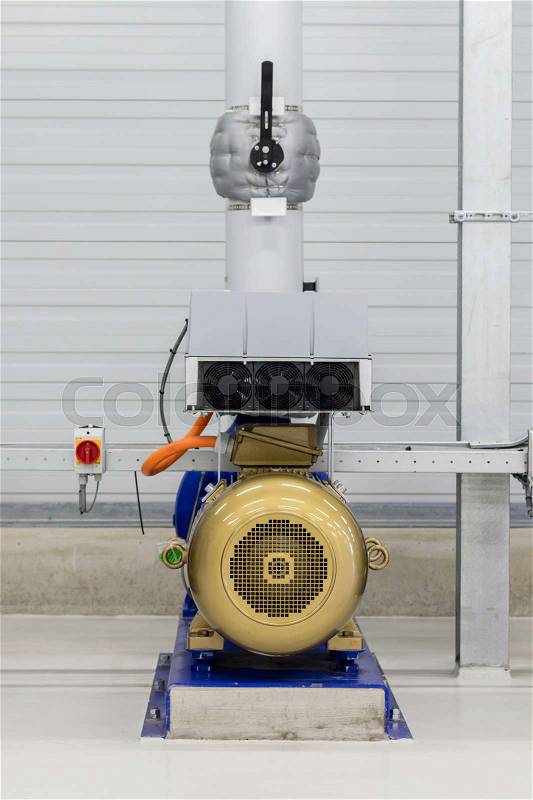 Electrical generator used for distributing water in a large area, stock photo