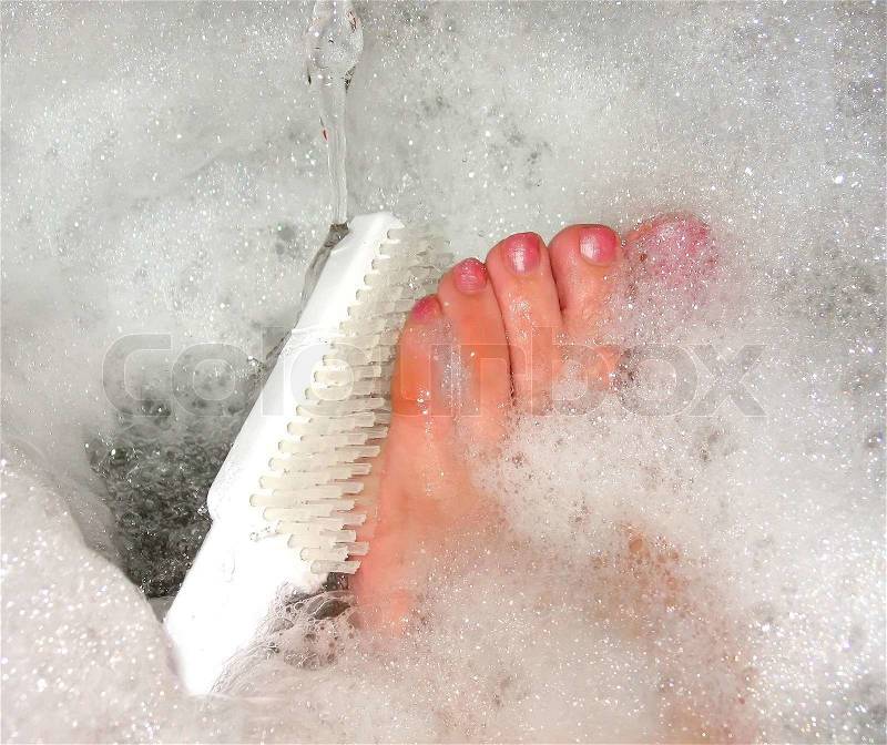 Foot care, cleaning brush, pedicure, stock photo