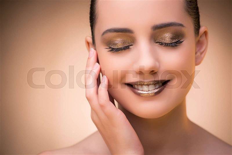 Woman with beautiful make-up against background, stock photo
