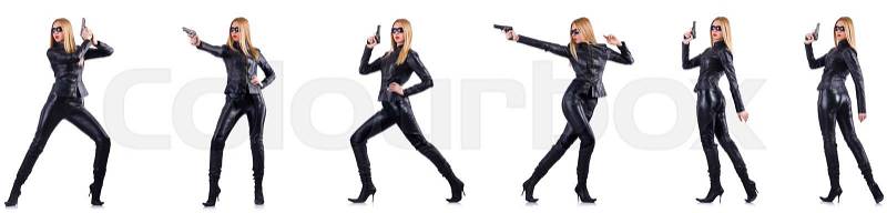 Woman in leather costume with gun isolated on white, stock photo