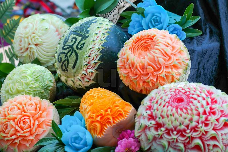 Fresh carved pumpkins and melons decorated by Thai carver, stock photo