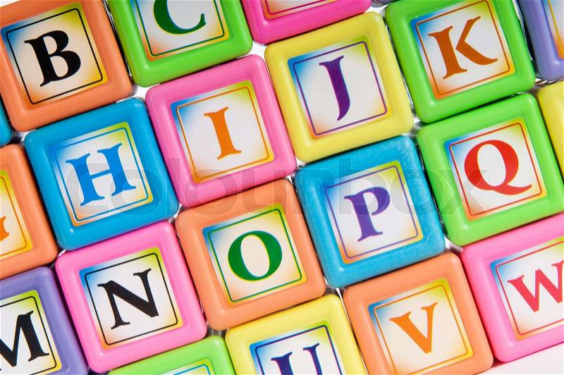 Learning and education concept - pile of alphabet blocks, stock photo