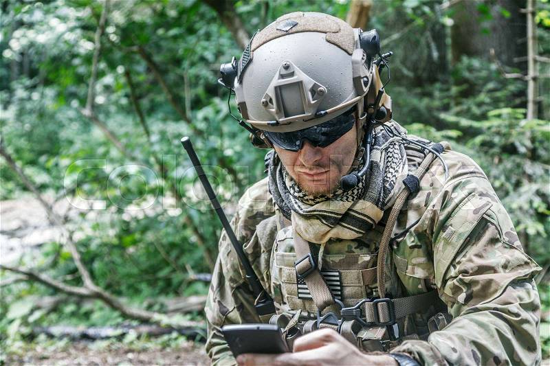 United states army ranger with the cellphone, stock photo
