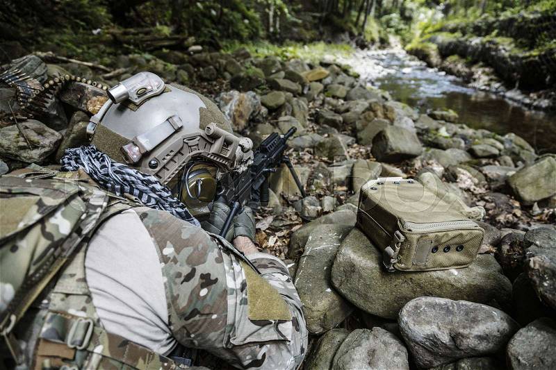 United states army ranger machine gunner in the forest, stock photo