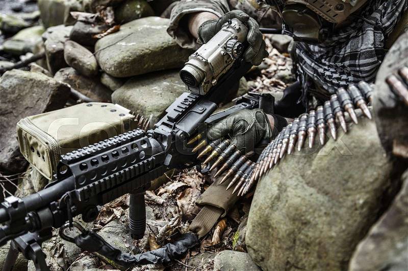 United states army ranger machine gunner in the forest, stock photo
