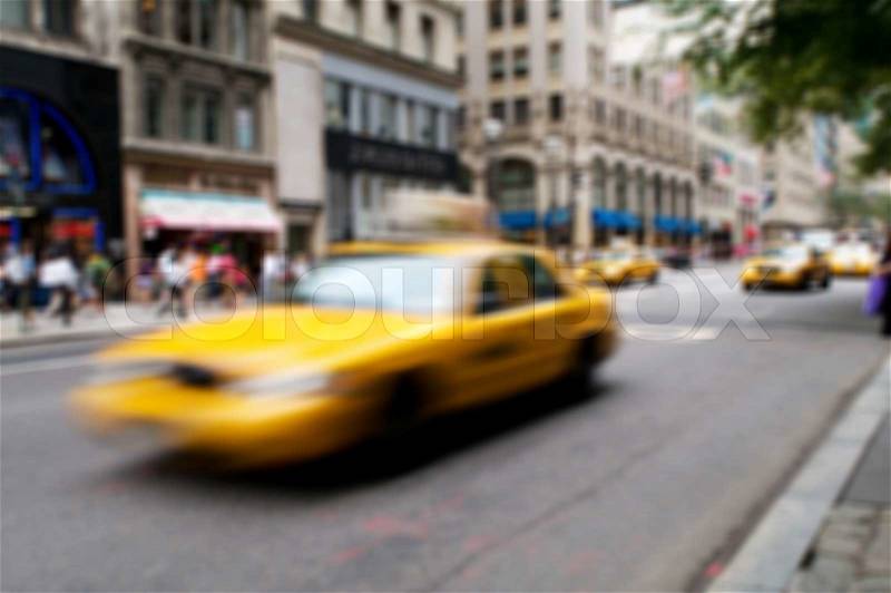 Famous New York yellow taxi cabs - intentional blur, stock photo