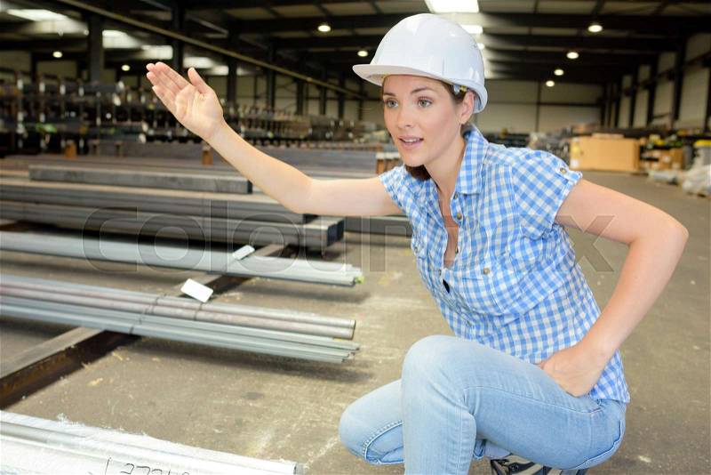 Production manager in the warehouse, stock photo