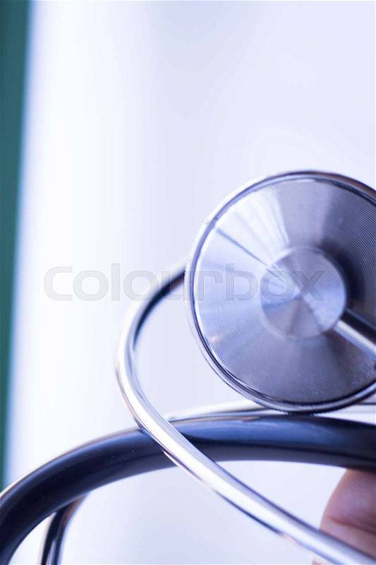 Medical doctor\'s stethoscope used to listen to patient heart rate, beats and monitor irregular heart beats, stock photo