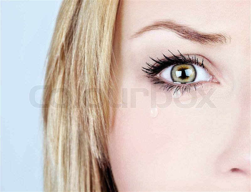 Crying woman, beautiful face with tear drops, facial expression, pain and grief concept, stock photo