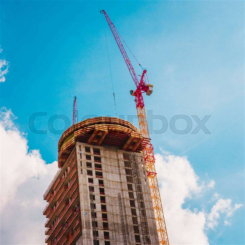 Crane and building construction. big building construction, stock photo