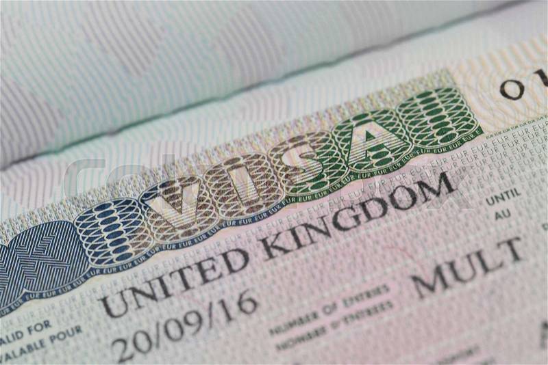 United kingdom visa stamp in passport, stock photo