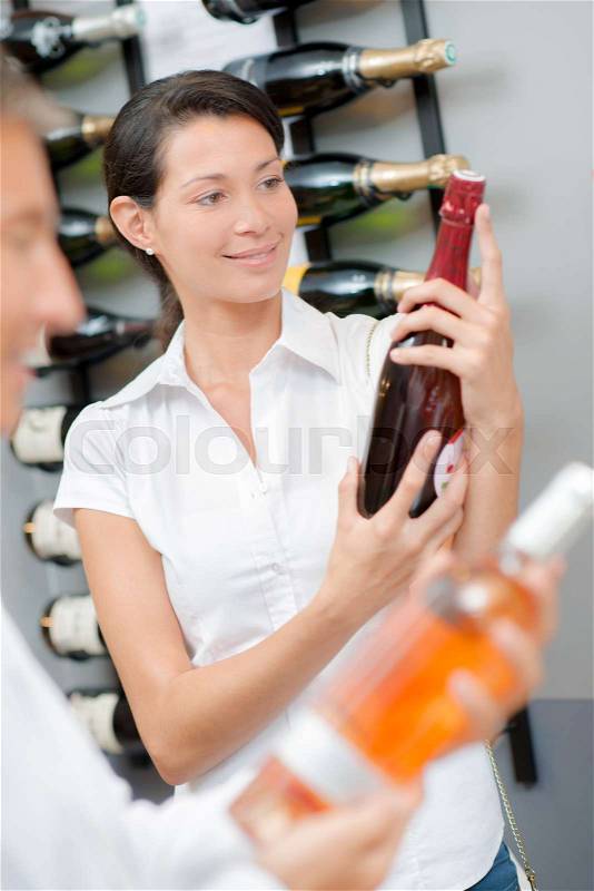 Selecting wine, stock photo